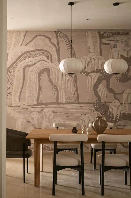 Indicative dining styling: timber table with pendant lighting above